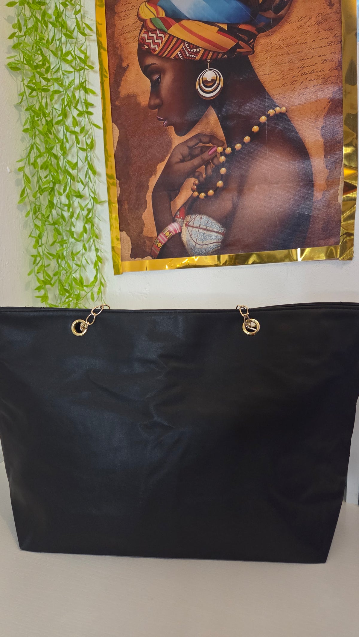 Women’s Black Quilted Handbag with Gold Chain